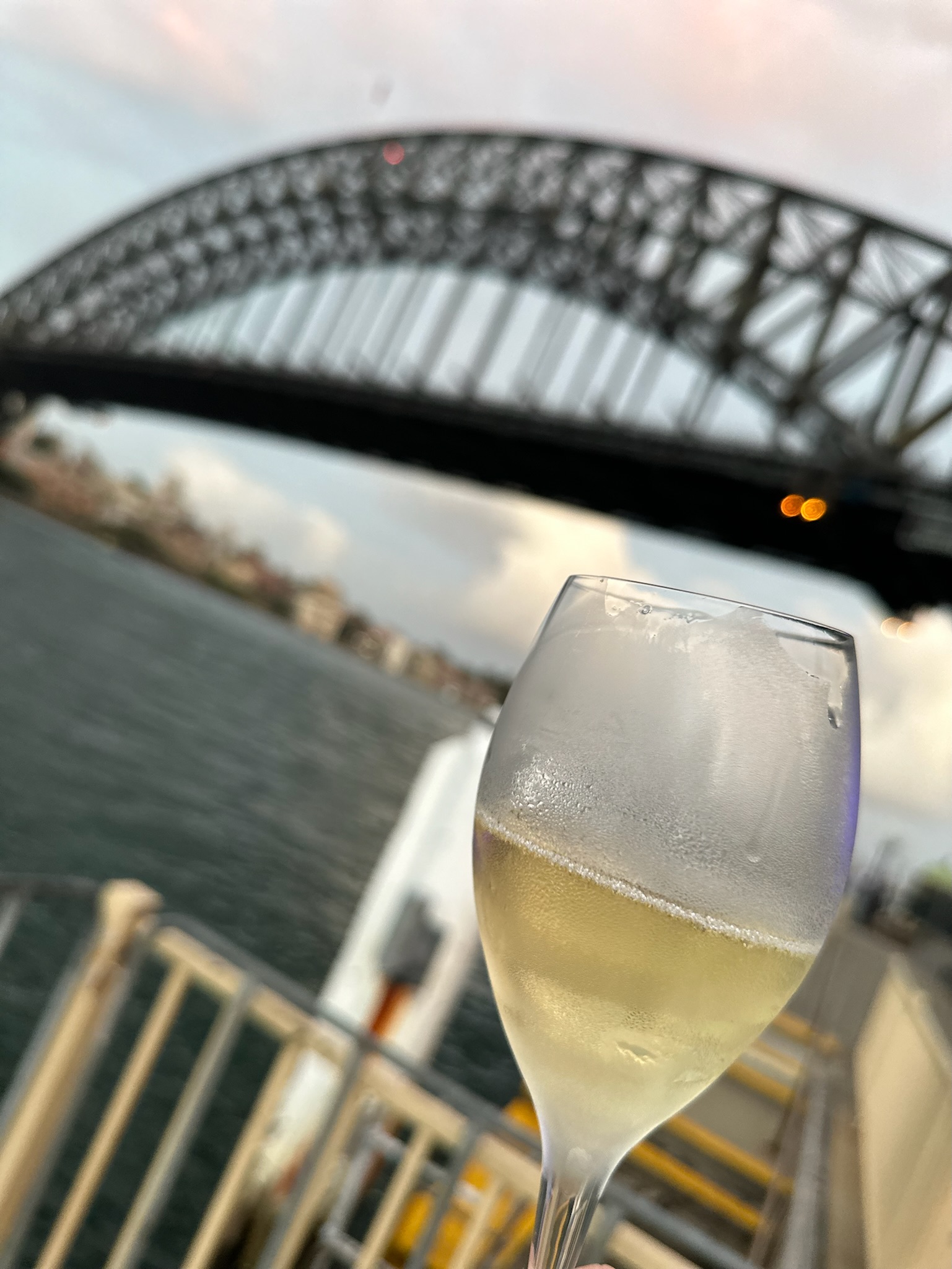 Champagne glass with Sydney Harbour Bridge in the background
